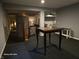 Versatile basement area with dark carpeting, gray walls, and open layout, ready for customization at 720 Erin Dr, Avon, IN 46123
