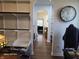 Large walk-in closet featuring custom shelving and a view into the next room at 720 Erin Dr, Avon, IN 46123