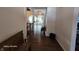 Inviting hallway with hardwood floors and elegant arched doorways, creating a seamless flow at 720 Erin Dr, Avon, IN 46123