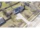 Expansive aerial view showcasing the home, driveway, and surrounding landscaped yard at 7401 E 56Th St, Indianapolis, IN 46226