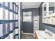 This bathroom offers a shower/tub and a decorative cabinet for plenty of storage space at 7401 E 56Th St, Indianapolis, IN 46226