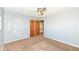 The bedroom offers carpeting and natural light with ample closet space at 7401 E 56Th St, Indianapolis, IN 46226