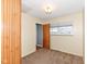 This bedroom offers a peaceful retreat with natural light and comfortable carpet at 7401 E 56Th St, Indianapolis, IN 46226