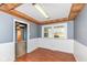 Bright dining room with wainscoting and wood trim, offering a cozy atmosphere at 7401 E 56Th St, Indianapolis, IN 46226