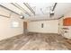 Spacious garage offers ample storage or parking space with natural light and a workshop area at 7401 E 56Th St, Indianapolis, IN 46226