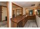 Finished basement with a wet bar, complete with counter space, sink, and cabinets for entertaining at 8331 Lookout Ct, Indianapolis, IN 46217