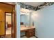 Bathroom with a light blue wall color featuring a vanity and mirror at 8331 Lookout Ct, Indianapolis, IN 46217