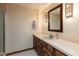 Bathroom with wooden cabinets and a sink with traditional fixtures at 8331 Lookout Ct, Indianapolis, IN 46217