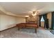 Spacious basement game room with a pool table and a stone fireplace, perfect for entertaining guests at 8331 Lookout Ct, Indianapolis, IN 46217