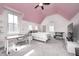 Bedroom featuring a pink ceiling, neutral walls, carpet, and lots of natural light at 10479 Dusty Rose Dr, Zionsville, IN 46077