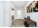 Bright entryway featuring wood flooring, a decorative console table, and stylish wall decor at 11180 Jubilation Way, Noblesville, IN 46060