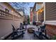Backyard with string lights, fire pit and Adirondack chairs for outdoor living at 13018 Deerstyne Green St, Carmel, IN 46032