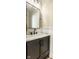 Bathroom with granite vanity, black fixtures, modern vanity, and wainscotting at 13018 Deerstyne Green St, Carmel, IN 46032