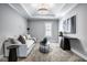 Cozy living room with contemporary decor, recessed lighting, and modern accents and decor at 13018 Deerstyne Green St, Carmel, IN 46032