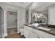 The primary bathroom offers double sinks, ample counter space, and a stylish walk-in shower at 16906 Sandhurst Pl, Westfield, IN 46074