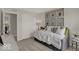 Well-lit bedroom showcasing animal-themed wall art, and gray carpets at 16906 Sandhurst Pl, Westfield, IN 46074
