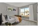 This cute bedroom features a tractor theme and a bright window providing lots of natural light at 16906 Sandhurst Pl, Westfield, IN 46074