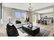 Open-concept living room with views of the dining area and kitchen, great for entertaining at 16959 Sandhurst Pl, Westfield, IN 46074