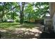 Lush backyard with mature trees and ample space for outdoor enjoyment at 1740 Haynes Ave, Indianapolis, IN 46240