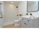 Modern bathroom featuring a walk-in shower, stylish vanity, and sleek black fixtures at 1740 Haynes Ave, Indianapolis, IN 46240
