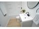 Stylish bathroom with a shower-tub combo, framed mirror, and modern fixtures at 1740 Haynes Ave, Indianapolis, IN 46240