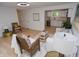 Cozy living room with light wood floors, neutral furniture, and a seamless flow to the modern kitchen at 1740 Haynes Ave, Indianapolis, IN 46240