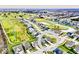 An aerial view of a beautiful residential neighborhood with a golf course and community pond at 2186 Chick Evans Way, Westfield, IN 46074