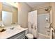 Stylish full bathroom with gray vanity, quartz countertop, and a shower/tub combination at 2186 Chick Evans Way, Westfield, IN 46074