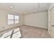 Bedroom with plush carpeting, recessed lights, a window, and a door at 2186 Chick Evans Way, Westfield, IN 46074