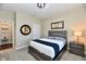 Inviting bedroom featuring neutral walls, cozy carpet, side table and decorative elements at 2186 Chick Evans Way, Westfield, IN 46074
