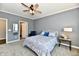 Comfortable bedroom with stylish decor and a ceiling fan at 2186 Chick Evans Way, Westfield, IN 46074