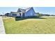 Residential home showcasing a well-maintained lawn and serene neighborhood setting at 2186 Chick Evans Way, Westfield, IN 46074