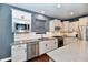 Bright kitchen with stainless appliances, and quartz countertops at 2186 Chick Evans Way, Westfield, IN 46074