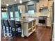 Stylish kitchen featuring stainless steel appliances, a large island, and bright white cabinetry at 2186 Chick Evans Way, Westfield, IN 46074