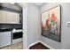A laundry room is shown next to artwork at 2186 Chick Evans Way, Westfield, IN 46074