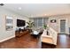 Bright living room with modern decor, hardwood floors, and abundant natural light at 2186 Chick Evans Way, Westfield, IN 46074