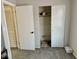Cozy bedroom featuring a closet, soft carpet, and fresh paint at 2308 W Surrey Dr, Muncie, IN 47304