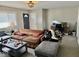 Comfortable living room with a light fixture and a view to the work space at 2308 W Surrey Dr, Muncie, IN 47304