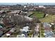 Wide aerial view capturing the city skyline, neighborhood, and community sports facilities at 2528 S New Jersey St, Indianapolis, IN 46225