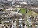 An aerial view of the neighborhood showcasing the school and football field nearby at 2528 S New Jersey St, Indianapolis, IN 46225