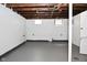 Spacious unfinished basement with concrete walls, small windows, offering a blank canvas for customization at 2528 S New Jersey St, Indianapolis, IN 46225