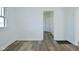 Dining room with fresh paint, wood-look floors and natural light at 2528 S New Jersey St, Indianapolis, IN 46225
