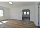 Bright and airy living room with light walls, modern floors, and ample natural light at 2528 S New Jersey St, Indianapolis, IN 46225