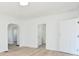 Spacious living room with fresh paint, wood-look floors and natural light at 2528 S New Jersey St, Indianapolis, IN 46225