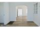 Entryway to the living room with fresh paint and wood-look floors at 2528 S New Jersey St, Indianapolis, IN 46225