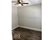 Bedroom featuring hardwood floors and neutral-painted walls at 302 S Randolph St, Indianapolis, IN 46201