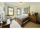 Comfortable bedroom with natural light, carpeted floors and warm decor at 3040 Old Morgantown Rd, Martinsville, IN 46151