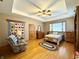 Large bedroom with a sitting area, and a ceiling fan for added comfort at 3040 Old Morgantown Rd, Martinsville, IN 46151
