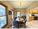 Charming dining area open to kitchen, featuring views and ample seating at 3040 Old Morgantown Rd, Martinsville, IN 46151