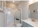 Clean bathroom featuring a shower with sliding glass doors, a sink and modern fixtures at 3547 Planck Cir, Danville, IN 46122